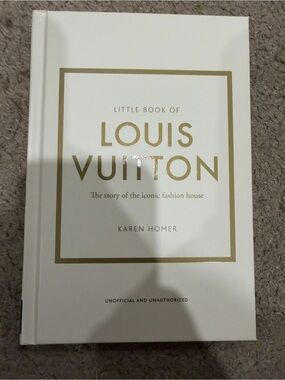 Louis Vuitton White Hardcover with Gold Foil Accents written by Karen Homer